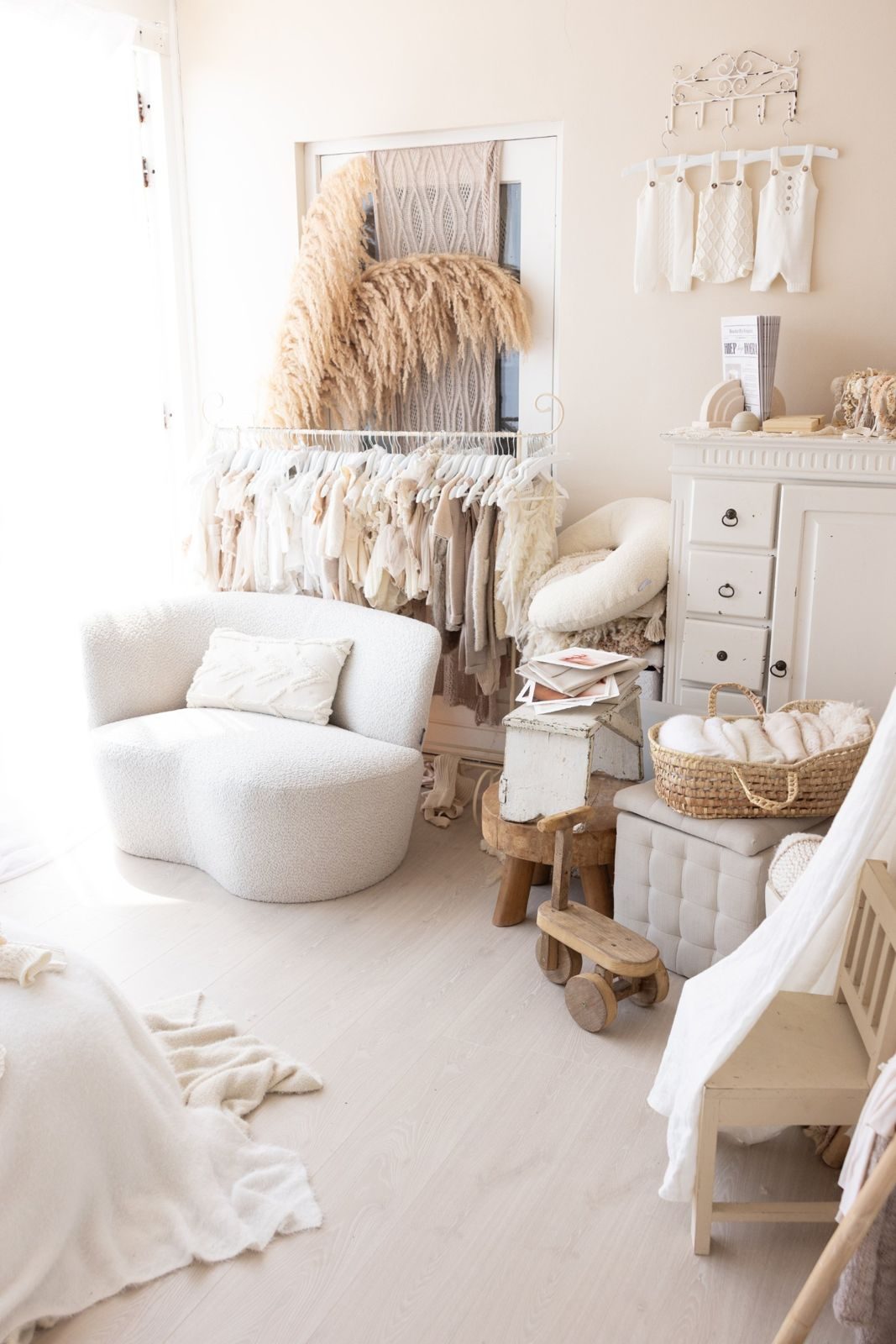 Brenda's small home studio with armchair, outfit rail and props